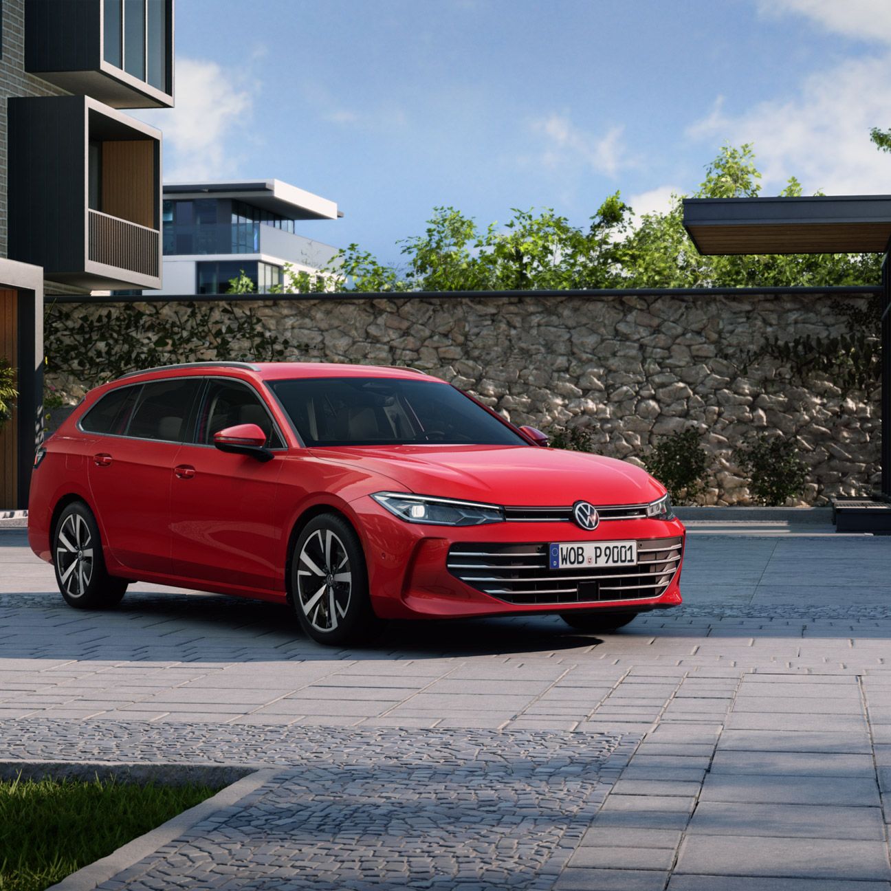 Um Passat vermelho encontra-se no pátio interior de um complexo residencial moderno, em perspetiva lateral e com a frente virada para o observador.