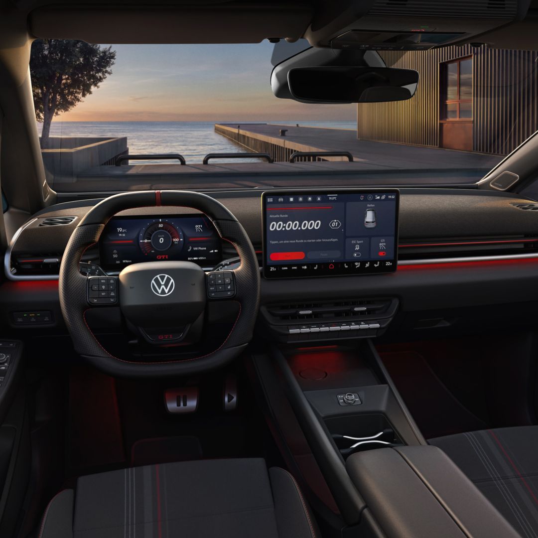 [AI-modified] – Vista do cockpit de um VW ID.3 GTI pouco antes do pôr do sol.