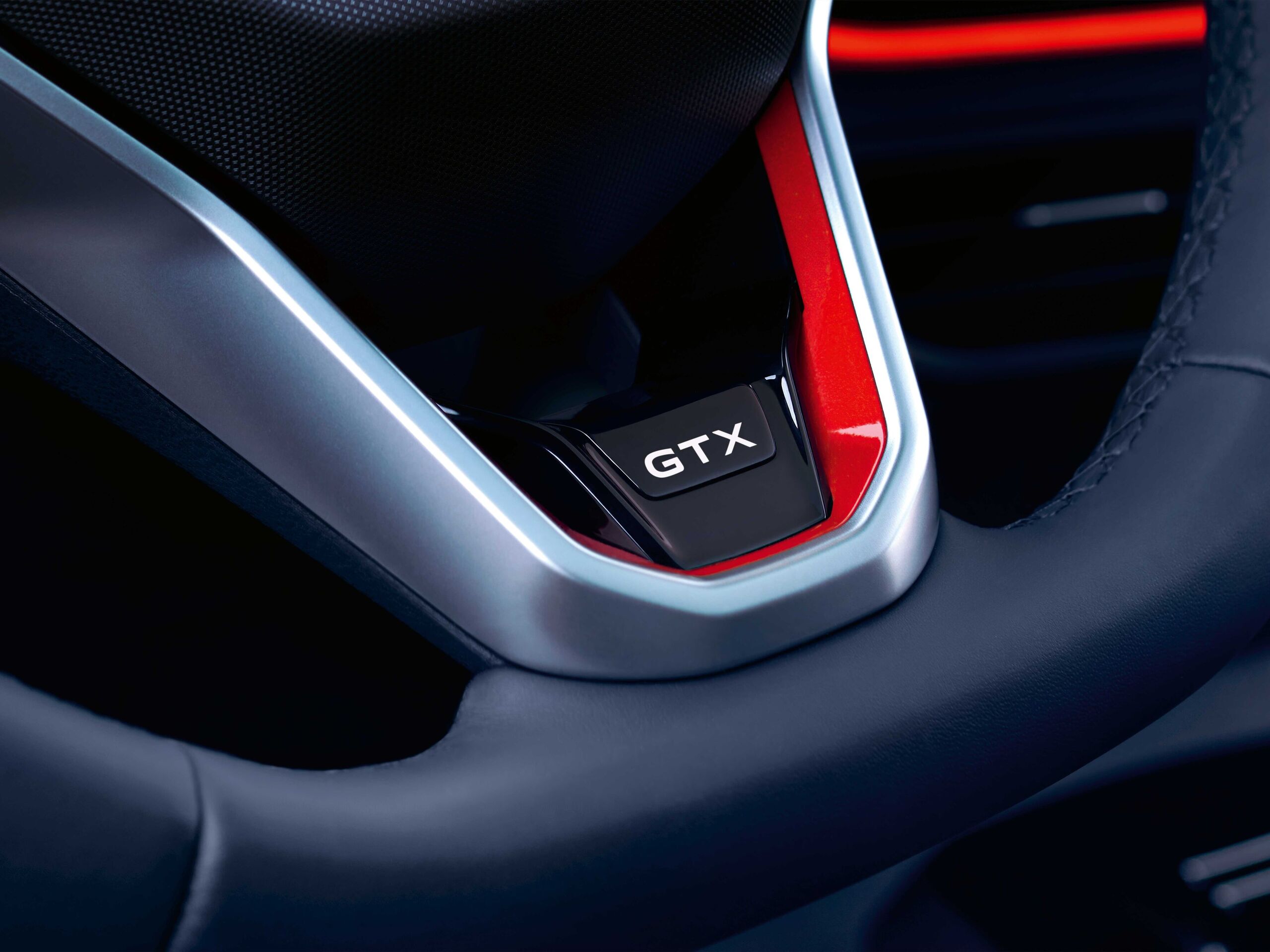 VW ID.4 GTX interior com vista para o volante com letras GTX.